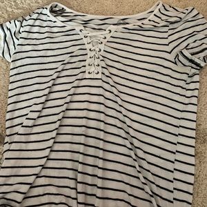 Black and white r shirt with crossed neckline.